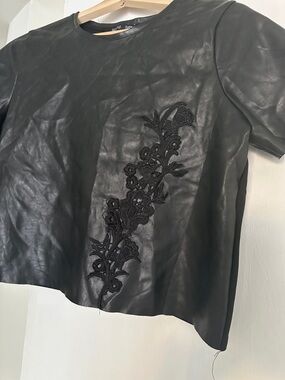 Zara Black Faux Leather Short Sleeve Top with Floral Appliqué